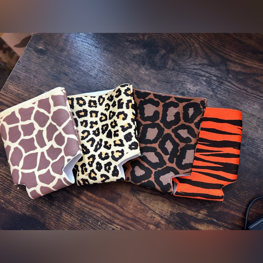 4 Animal print can koozies. Brand new-never used.